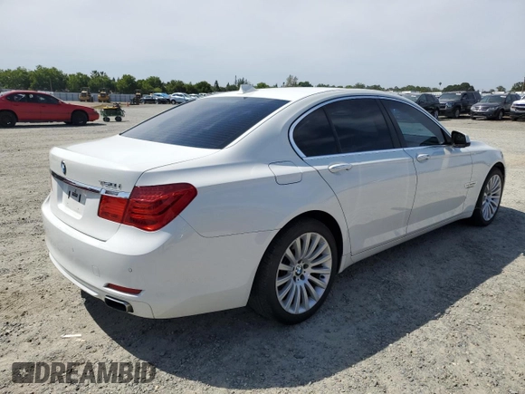 2012 BMW 7 Series 750i xDrive with VIN WBAKC6C56CDX99416, listed as a Copart auction lot 54857715 with 114,198 mi miles and Salvage Title. Bid and sale history available at DreamBid. Image 3.