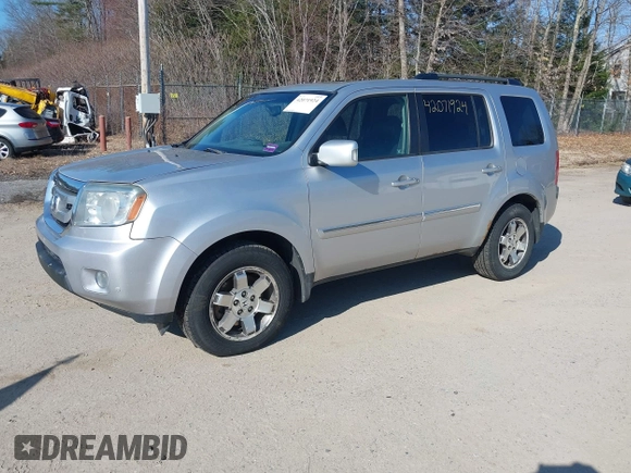 2011 Honda Pilot Touring with VIN 5FNYF4H96BB012122, listed as a IAAI auction lot 42071924 with 211,000 mi miles. Bid and sale history available at carsss.com. Image 2.