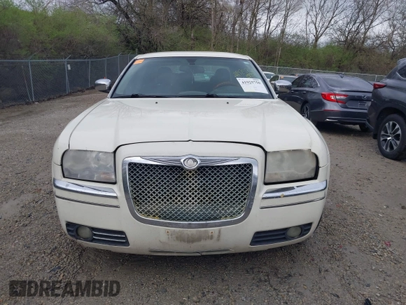 2005 Chrysler 300 with VIN 2C3JA63H25H686717, listed as a IAAI auction lot 41925750 with 230,196 mi miles. Bid and sale history available at carsss.com. Image 12.