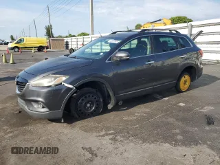 2015 Mazda CX-9 Grand Touring z VIN JM3TB2DA7F0460410, wystawiony jako Copart lot #59307995 z przebiegiem Nie podano mil oraz Czysty tytuł • Clean title. Historia ofert i sprzedaży dostępna na DreamBid. Obrazek 1.