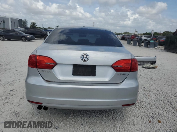 2013 Volkswagen Jetta SE z VIN 3VWDP7AJ8DM354734, wystawiony jako Copart lot #61147355 z przebiegiem 103 428 mil mil oraz Szkoda całkowita • Salvage title. Historia ofert i sprzedaży dostępna na DreamBid. Obrazek 6.