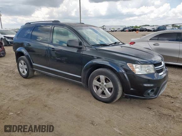2012 Dodge Journey SXT with VIN 3C4PDCBG9CT208187, listed as a Copart auction lot 61969185 with 156,295 mi miles and Salvage title. Bid and sale history available at DreamBid. Image 4.