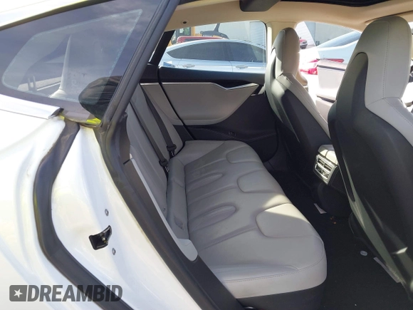 2014 Tesla Model S 60 with VIN 5YJSA1H13EFP62451, listed as a IAAI auction lot 41639068 with 88,000 mi miles and . Bid and sale history available at DreamBid. Image 8.