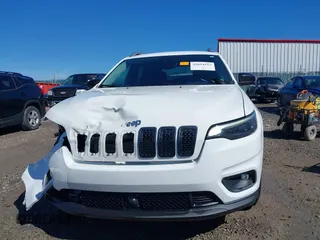 2021 Jeep Cherokee Altitude with VIN 1C4PJLLBXMD164087, listed as a IAAI auction lot 41694113 with 76,352 mi miles. Bid and sale history available at carsss.com. Image 12.