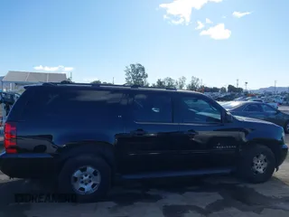 2014 Chevrolet Suburban LT with VIN 1GNSCJE08ER240230, listed as a IAAI auction lot 41702593 with 140,190 mi miles. Bid and sale history available at carsss.com. Image 13.