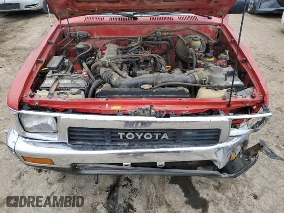 1991 Toyota Pickup DX z VIN JT4RN01P0M7042332, wystawiony jako Copart lot #42408835 z przebiegiem 211 481 mil mil oraz Szkoda całkowita • Salvage title. Historia ofert i sprzedaży dostępna na DreamBid. Obrazek 11.