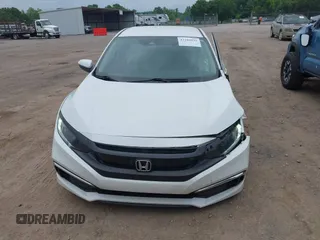 2020 Honda Civic LX z VIN 19XFC2F66LE021813, wystawiony jako IAAI lot #42285033 z przebiegiem 116 069 mil mil oraz . Historia ofert i sprzedaży dostępna na DreamBid. Obrazek 12.