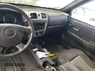 2011 GMC Canyon SLT with VIN 1GTH6NFE2B8117617, listed as a Copart auction lot 43222695 with 146,277 mi miles and Salvage Title. Bid and sale history available at carsss.com. Image 8.