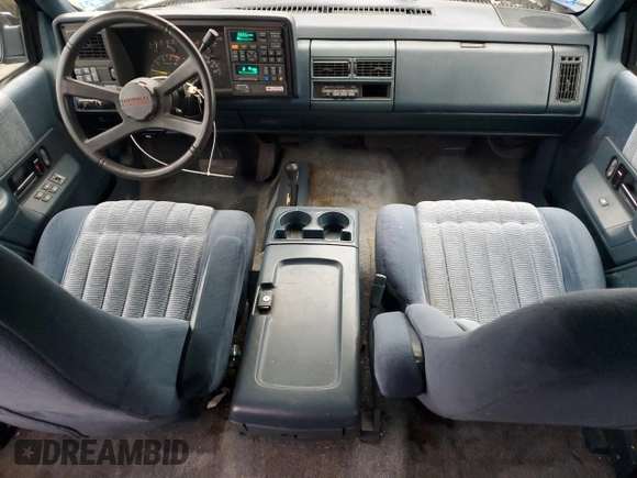 1994 Chevrolet Suburban z VIN 1GNFK16K4RJ348093, wystawiony jako Copart lot #87352784 z przebiegiem 118 442 mil mil oraz Nie do naprawy • Non repairable. Historia ofert i sprzedaży dostępna na DreamBid. Obrazek 8.