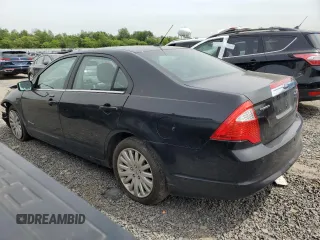 2010 Ford Fusion Hybrid с VIN 3FADP0L34AR129353, выставлен на аукционе Copart как лот 58310725 с пробегом 237 662 миль миль и Списание • Salvage title. История ставок и продаж доступна на DreamBid. Изображение 2.