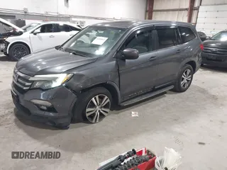 2016 Honda Pilot EX-L with VIN 5FNYF6H5XGB010230, listed as a IAAI auction lot 41858811 with 194,119 mi miles. Bid and sale history available at carsss.com. Image 17.