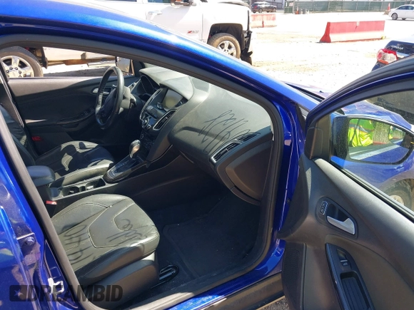 2015 Ford Focus Titanium with VIN 1FADP3J20FL304828, listed as a IAAI auction lot 42144101 with 199,715 mi miles and . Bid and sale history available at carsss.com. Image 5.