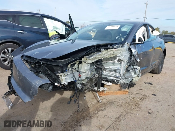 2025 Tesla Model 3 Long Range with VIN 5YJ3E1EB4SF873799, listed as a IAAI auction lot 41548818 with 2,129 mi miles and . Bid and sale history available at DreamBid. Image 6.