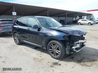 2021 BMW X3 sDrive30i with VIN 5UXTY3C09M9E84594, listed as a IAAI auction lot 42013486 with 58,044 mi miles. Bid and sale history available at carsss.com. Image 1.