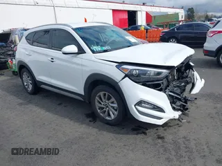 2018 Hyundai Tucson SEL z VIN KM8J33A40JU808319, wystawiony jako IAAI lot #41708215 z przebiegiem 72 934 mil mil oraz . Historia ofert i sprzedaży dostępna na DreamBid. Obrazek 1.