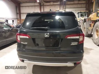 2020 Honda Pilot Touring 7-Passenger with VIN 5FNYF6H63LB032301, listed as a IAAI auction lot 38419333 with 50,433 mi miles and . Bid and sale history available at carsss.com. Image 17.