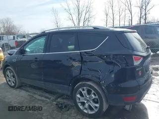 2014 Ford Escape Titanium with VIN 1FMCU9J9XEUC15464, listed as a IAAI auction lot 41524925 with 160,445 mi miles. Bid and sale history available at carsss.com. Image 14.