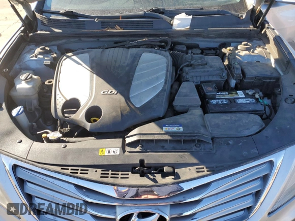 2014 Hyundai Azera Limited z VIN KMHFH4JG3EA360317, wystawiony jako Copart lot #79748564 z przebiegiem Nie podano mil oraz Szkoda całkowita • Salvage title. Historia ofert i sprzedaży dostępna na DreamBid. Obrazek 12.