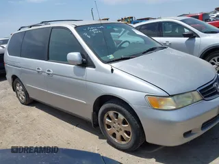 2003 Honda Odyssey EX z VIN 5FNRL18633B036686, wystawiony jako IAAI lot #42290906 z przebiegiem 201 773 mil mil oraz . Historia ofert i sprzedaży dostępna na DreamBid. Obrazek 1.
