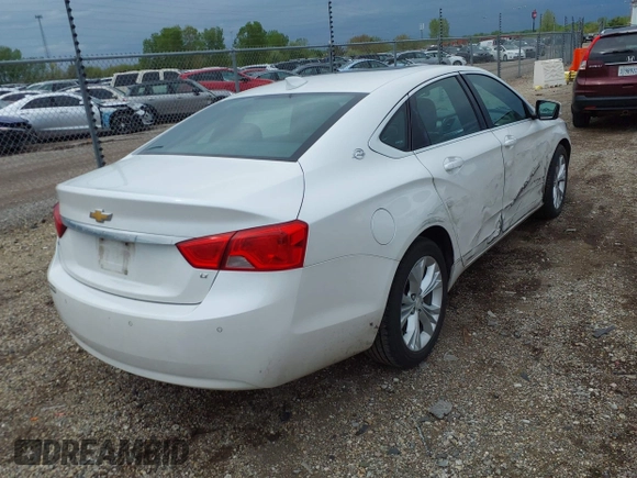 2015 Chevrolet Impala LT with VIN 1G1125S30FU140935, listed as a IAAI auction lot 42153988 with 147,828 mi miles and . Bid and sale history available at DreamBid. Image 4.