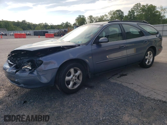 2001 Ford Taurus SE Standard with VIN 1FAHP58S71G184725, listed as a Copart auction lot 56401895 with 163,238 mi miles and Salvage title. Bid and sale history available at DreamBid. Image 1.
