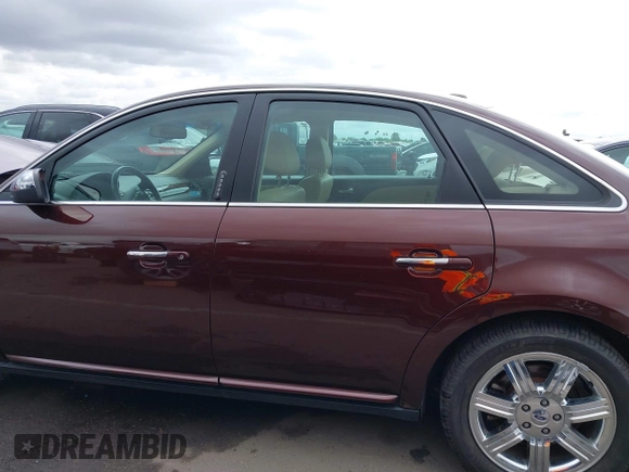 2009 Ford Taurus Limited z VIN 1FAHP25W59G115291, wystawiony jako IAAI lot #42195549 z przebiegiem 58 983 mil mil oraz . Historia ofert i sprzedaży dostępna na DreamBid. Obrazek 15.