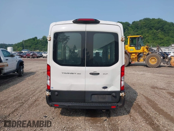 2019 Ford Transit Passenger XL z VIN 1FBAX2CM8KKA31115, wystawiony jako IAAI lot #42366286 z przebiegiem 222 359 mil mil oraz . Historia ofert i sprzedaży dostępna na DreamBid. Obrazek 16.