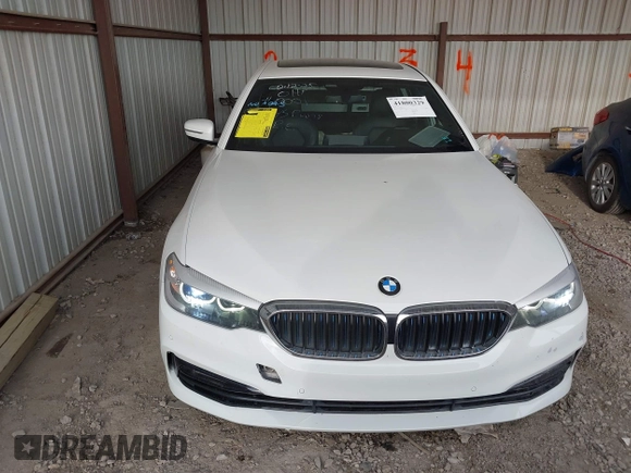 2018 BMW 5 Series 530e with VIN WBAJA9C57JB034128, listed as a IAAI auction lot 41800329 with 66,684 mi miles and . Bid and sale history available at DreamBid. Image 13.