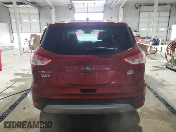 2016 Ford Escape SE with VIN 1FMCU9GX4GUA80300, listed as a Copart auction lot 52875305 with 247,537 mi miles and Salvage Title. Bid and sale history available at DreamBid. Image 6.
