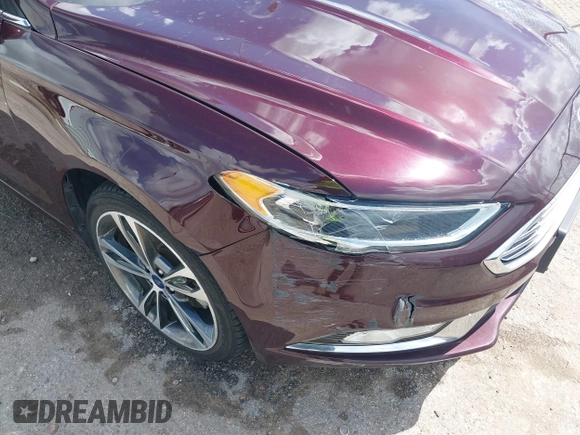 2017 Ford Fusion Titanium with VIN 3FA6P0K97HR214485, listed as a IAAI auction lot 40208619 with 39,265 mi miles and . Bid and sale history available at DreamBid. Image 17.
