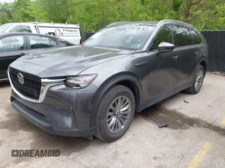 2024 Mazda CX-90 Preferred Plus with VIN JM3KKCHD3R1161534, listed as a IAAI auction lot 42170822 with 23,158 mi miles and . Bid and sale history available at DreamBid. Image 2.