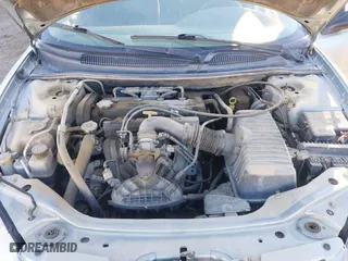 2004 Dodge Stratus SE with VIN 1B3EL36X24N267301, listed as a IAAI auction lot 41402238 with 143,579 mi miles. Bid and sale history available at carsss.com. Image 10.