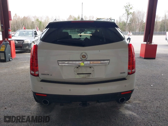 2015 Cadillac SRX Luxury Collection with VIN 3GYFNEE30FS567431, listed as a IAAI auction lot 42118084 with 140,778 mi miles. Bid and sale history available at carsss.com. Image 16.