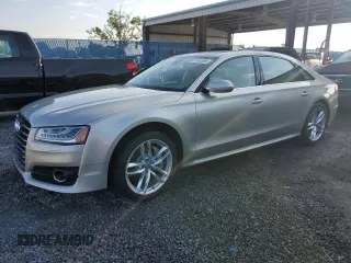 2017 Audi A8 Sport z VIN WAU43AFD0HN002058, wystawiony jako Copart lot #53180585 z przebiegiem 95 436 mil mil oraz Szkody całkowita. Historia ofert i sprzedaży dostępna na DreamBid. Obrazek 1.