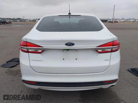 2018 Ford Fusion SE z VIN 3FA6P0H73JR212616, wystawiony jako IAAI lot #40869945 z przebiegiem 142 355 mil mil oraz . Historia ofert i sprzedaży dostępna na DreamBid. Obrazek 16.