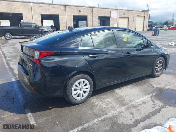 2019 Toyota Prius L Eco with VIN JTDKARFU8K3082503, listed as a IAAI auction lot 41809373 with 247,315 mi miles. Bid and sale history available at carsss.com. Image 4.