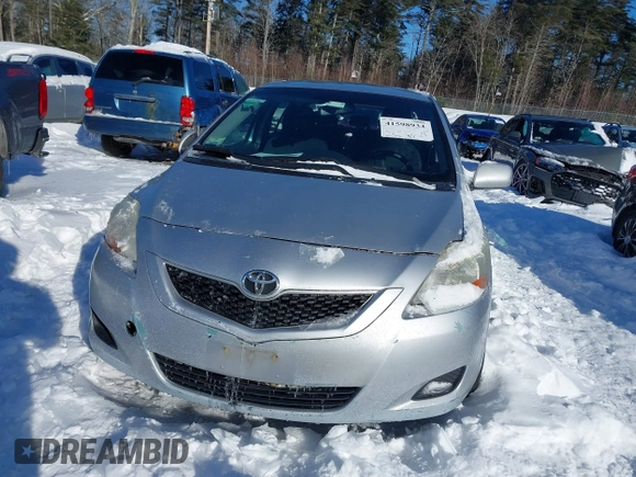 2009 Toyota Yaris with VIN JTDBT903191334821, listed as a IAAI auction lot 41598934 with 235,248 mi miles. Bid and sale history available at carsss.com. Image 6.