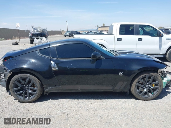 2019 Nissan 370Z Sport Touring with VIN JN1AZ4EH1KM420719, listed as a IAAI auction lot 42096816 with 97,803 mi miles and . Bid and sale history available at DreamBid. Image 14.