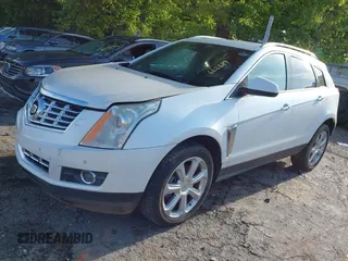 2014 Cadillac SRX Performance Collection with VIN 3GYFNCE36ES662689, listed as a IAAI auction lot 42109417 with 132,957 mi miles. Bid and sale history available at carsss.com. Image 19.