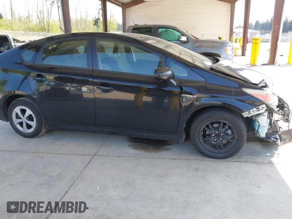 2015 Toyota Prius Four with VIN JTDKN3DU1F1899480, listed as a IAAI auction lot 42127015 with 247,659 mi miles and . Bid and sale history available at DreamBid. Image 14.