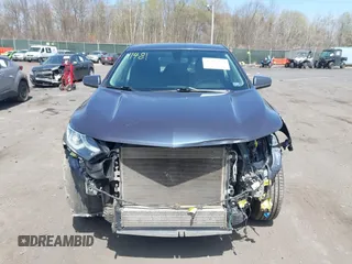 2019 Chevrolet Equinox LT z VIN 3GNAXUEV8KL246366, wystawiony jako IAAI lot #42096439 z przebiegiem 87 632 mil mil oraz . Historia ofert i sprzedaży dostępna na DreamBid. Obrazek 12.