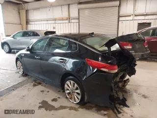 2018 Kia Optima EX with VIN 5XXGU4L30JG182878, listed as a IAAI auction lot 41733244 with 134,642 mi miles. Bid and sale history available at carsss.com. Image 3.