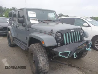 2015 Jeep Wrangler Unlimited Sahara with VIN 1C4BJWEG6FL678886, listed as a IAAI auction lot 42203813 with 116,413 mi miles and . Bid and sale history available at DreamBid. Image 1.