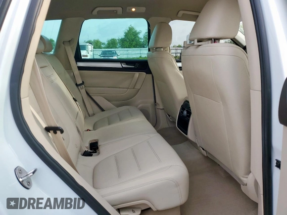 2012 Volkswagen Touareg Sport z VIN WVGEF9BP4CD007058, wystawiony jako Copart lot #56971745 z przebiegiem 181 221 mil mil oraz Czysty tytuł • Clean title. Historia ofert i sprzedaży dostępna na DreamBid. Obrazek 10.