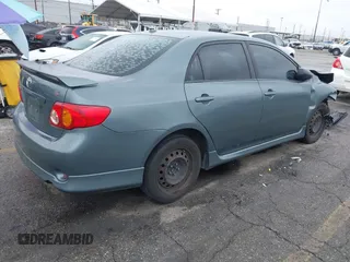 2009 Toyota Corolla with VIN 1NXBU40E49ZO81912, listed as a IAAI auction lot 41806599 with 216,989 mi miles. Bid and sale history available at carsss.com. Image 4.