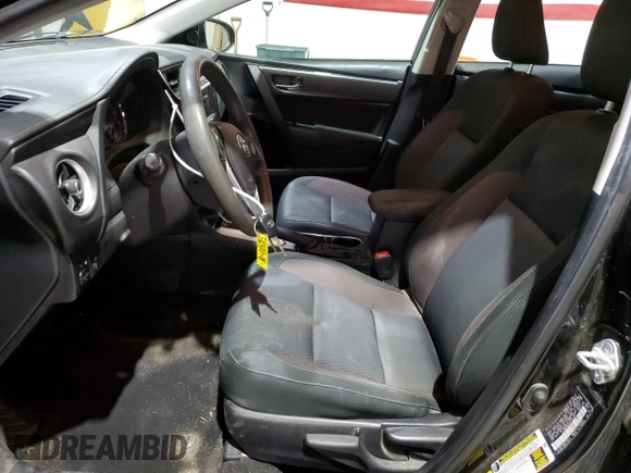 2019 Toyota Corolla L with VIN 2T1BURHE5KC185821, listed as a Copart auction lot 52613985 with 104,208 mi miles and Salvage title. Bid and sale history available at DreamBid. Image 7.