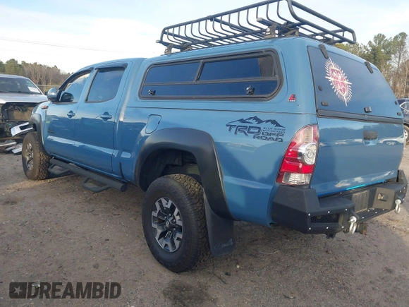 2015 Toyota Tacoma with VIN 3TMMU4FN7FM079866, listed as a IAAI auction lot 41618881 with 165,268 mi miles. Bid and sale history available at carsss.com. Image 3.