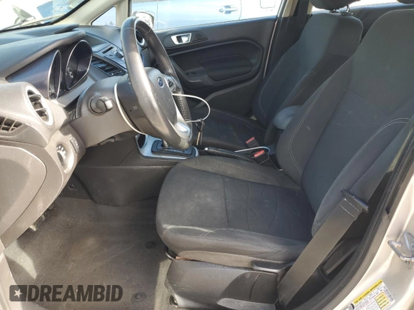 2015 Ford Fiesta SE z VIN 3FADP4EJ3FM115449, wystawiony jako Copart lot #57408015 z przebiegiem 175 083 mil mil oraz Czysty tytuł • Clean title. Historia ofert i sprzedaży dostępna na DreamBid. Obrazek 7.