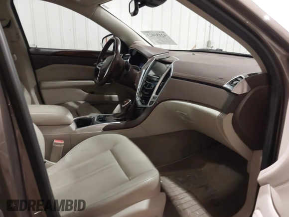 2014 Cadillac SRX Performance Collection z VIN 3GYFNFE38ES578066, wystawiony jako IAAI lot #42153023 z przebiegiem 134 009 mil mil oraz . Historia ofert i sprzedaży dostępna na DreamBid. Obrazek 5.