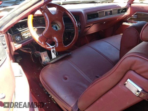 1972 Cadillac Eldorado z VIN 6D47R2Q198947, wystawiony jako Copart lot #67572714 z przebiegiem 63 965 mil mil oraz Nie do naprawy • Non repairable. Historia ofert i sprzedaży dostępna na DreamBid. Obrazek 8.